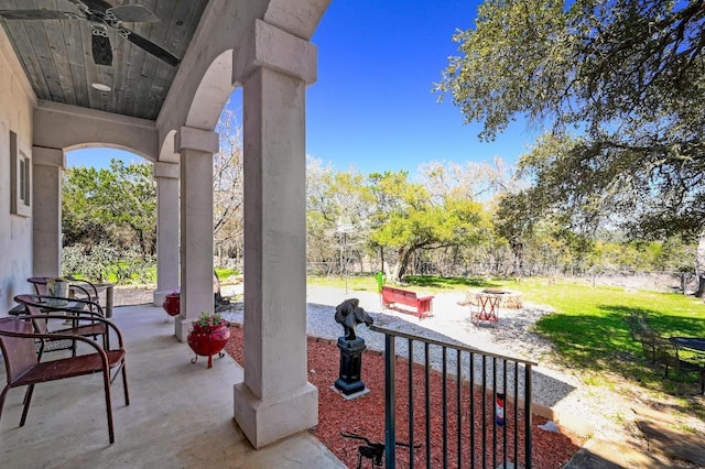 view of patio featuring ceiling fan