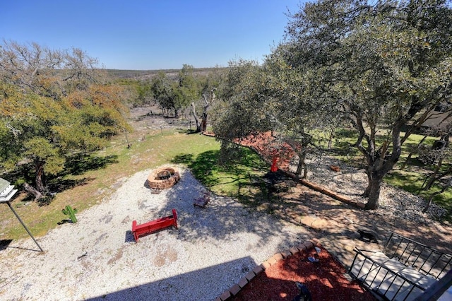 1401 Thurman Rd, San Marcos, TX 78666 - view of yard featuring a fire pit