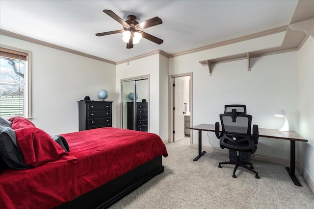 bedroom featuring baseboards, ceiling fan, ornamental molding, light colored carpet, and connected bathroom