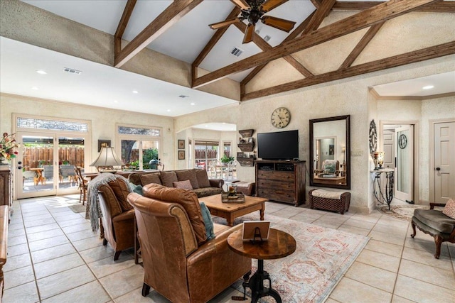 living area with beamed ceiling, plenty of natural light, visible vents, and high vaulted ceiling