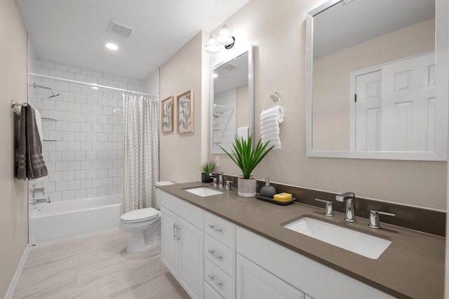 full bathroom featuring shower / tub combo, toilet, visible vents, and a sink