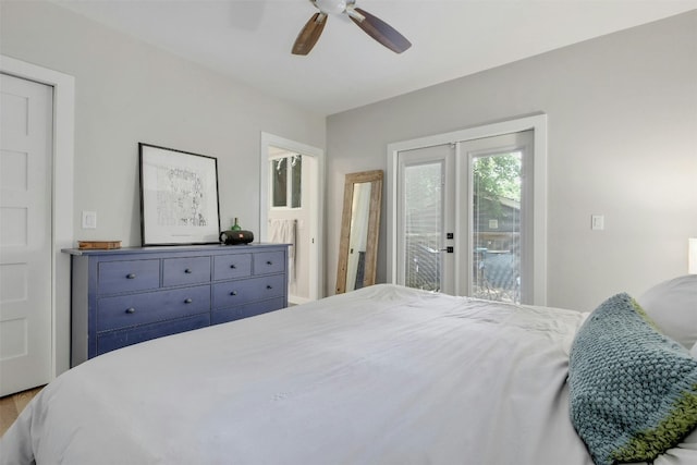 bedroom featuring access to exterior and a ceiling fan