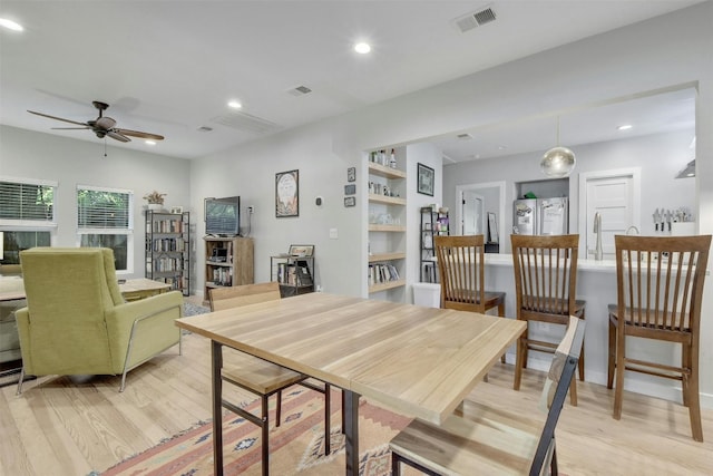 dining space with recessed lighting, visible vents, light wood-style flooring, and ceiling fan