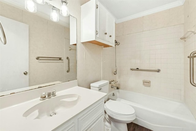 bathroom with tub / shower combination, vanity, toilet, and crown molding