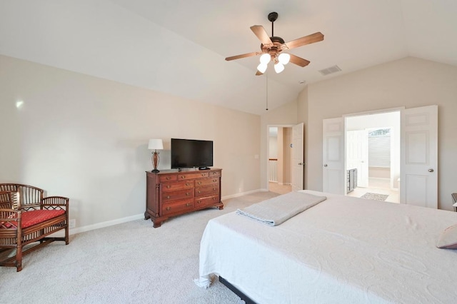 bedroom featuring vaulted ceiling, baseboards, visible vents, and light carpet