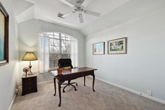 office space featuring baseboards, lofted ceiling, and carpet flooring