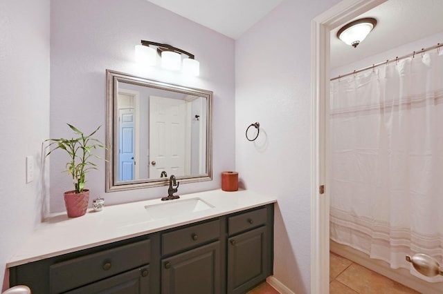 full bath with tile patterned floors, curtained shower, and vanity