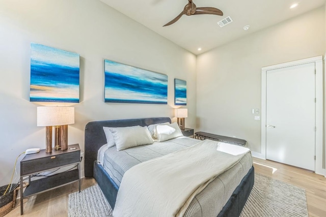 bedroom with visible vents, recessed lighting, ceiling fan, and wood finished floors