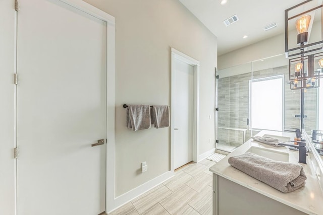 full bathroom with vanity, baseboards, visible vents, recessed lighting, and a stall shower