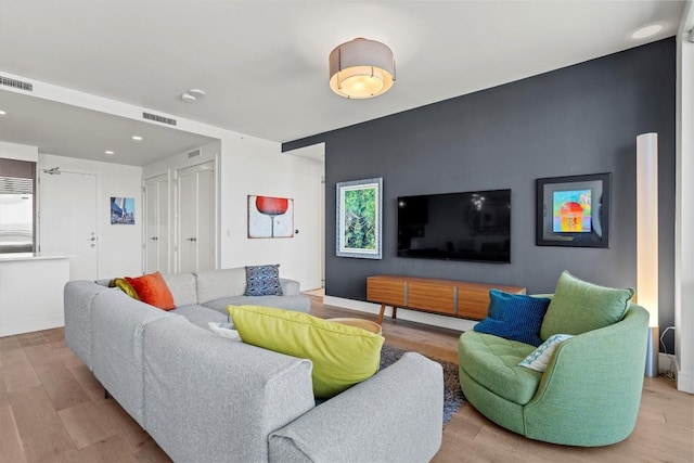 222 W Ave Unit 2806, Austin, TX 78701 - living area featuring wood finished floors and recessed lighting