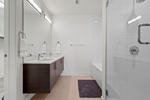 222 W Ave Unit 2806, Austin, TX 78701 - bathroom with tiled shower, vanity, tile patterned floors, and a tub to relax in