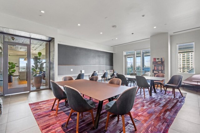 222 W Ave Unit 2806, Austin, TX 78701 - dining area with light tile patterned floors and recessed lighting