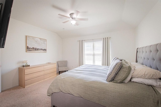 bedroom featuring lofted ceiling, carpet, and ceiling fan