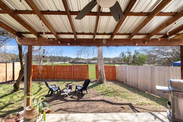 view of yard featuring a fenced backyard and an outdoor fire pit