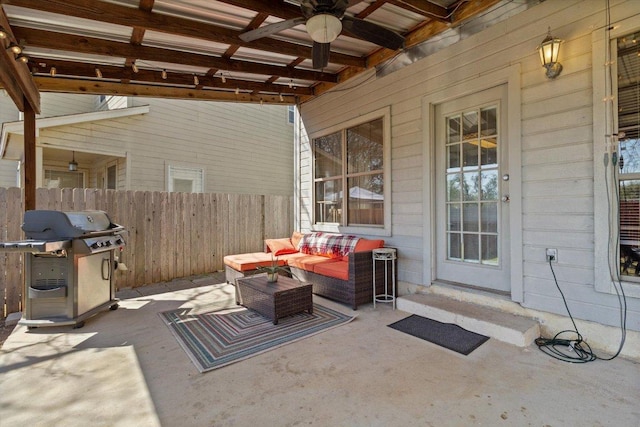 view of patio / terrace featuring grilling area, outdoor lounge area, and fence