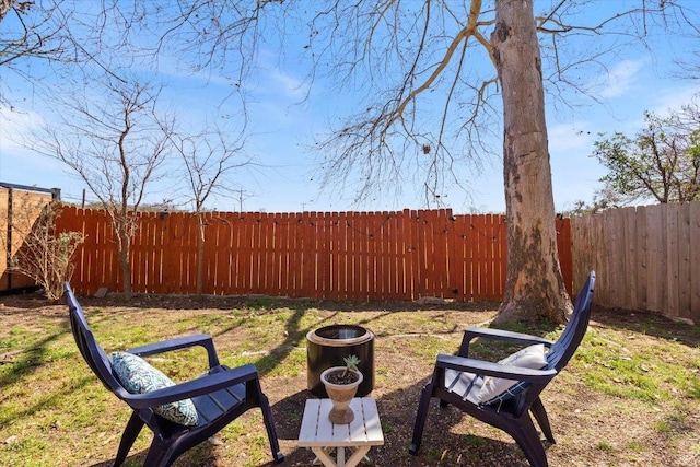 view of yard with a fenced backyard