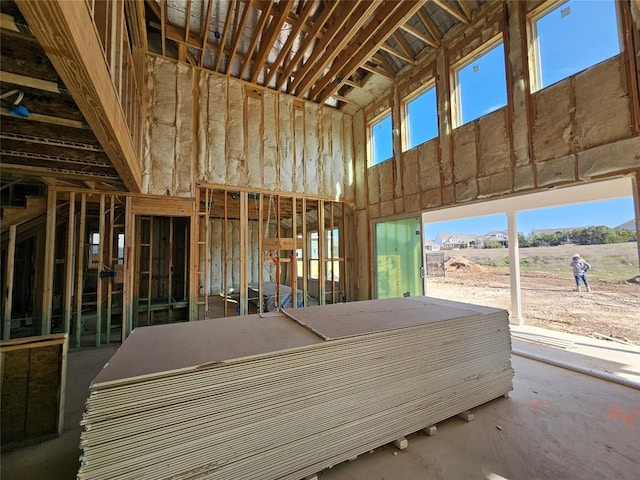 miscellaneous room featuring a high ceiling