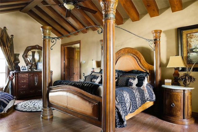 bedroom with hardwood / wood-style floors and lofted ceiling with beams