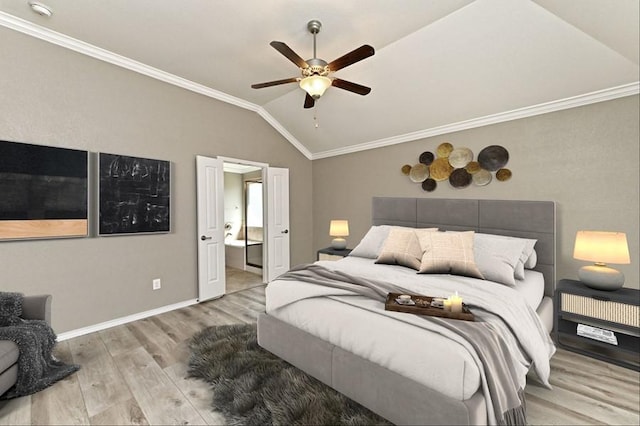 bedroom with baseboards, wood finished floors, crown molding, and vaulted ceiling