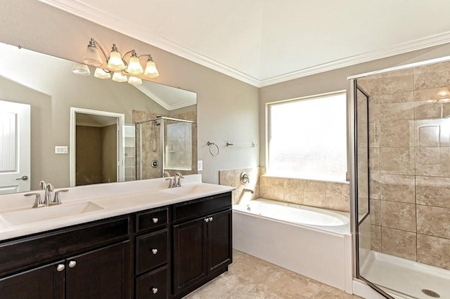 full bathroom featuring ornamental molding, a sink, a shower stall, double vanity, and a bath