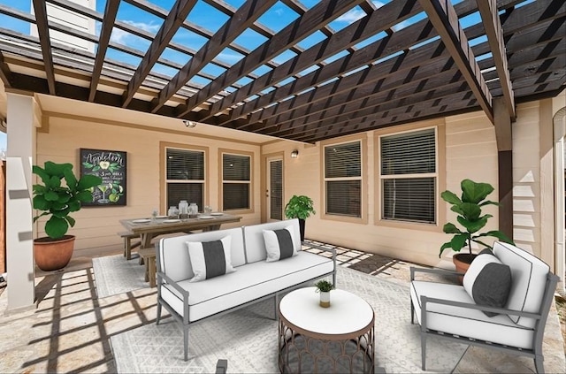 view of patio / terrace featuring outdoor dining space, an outdoor living space, and a pergola