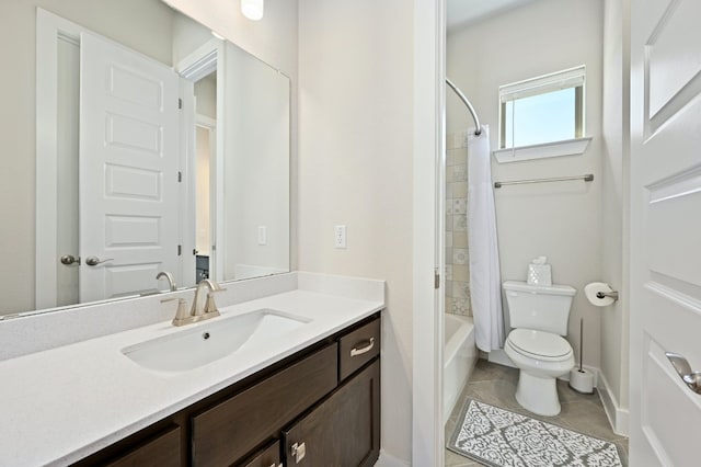 340 Axis Loop, Georgetown, TX 78628 - bathroom featuring vanity, toilet, shower / tub combo, tile patterned floors, and baseboards
