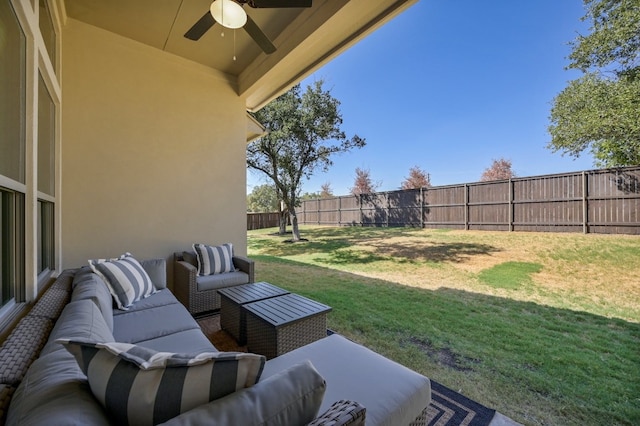 view of yard with a ceiling fan, outdoor lounge area, and a fenced backyard