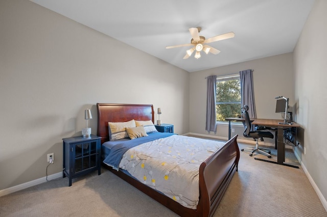 bedroom featuring baseboards, ceiling fan, and carpet flooring