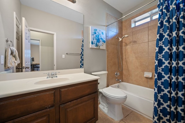 full bath with tile patterned flooring, toilet, vanity, and shower / bath combo