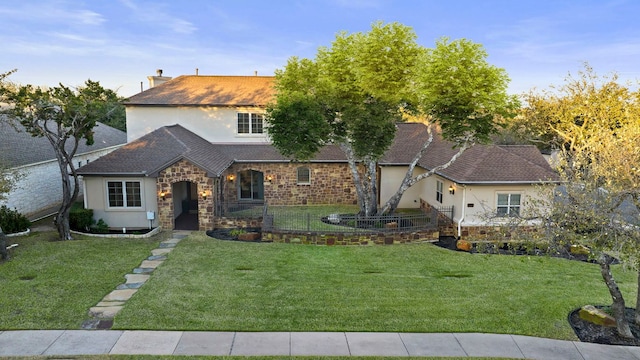 12500 Verandah Ct, Austin, TX 78726 - view of front of home with stucco siding, roof with shingles, and stone siding