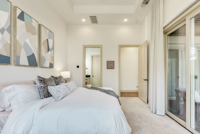 bedroom with visible vents, recessed lighting, and light carpet