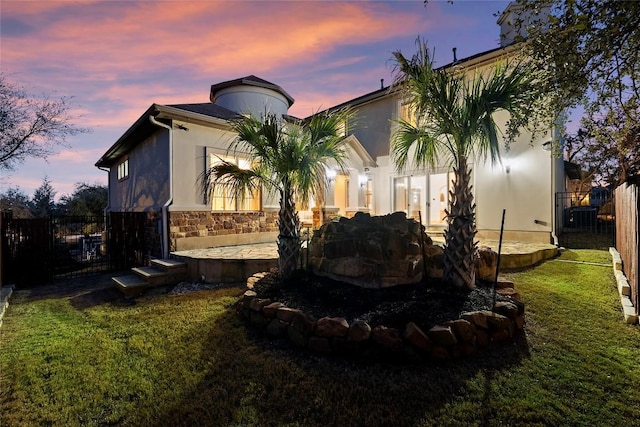 12500 Verandah Ct, Austin, TX 78726 - rear view of property featuring stone siding and stucco siding