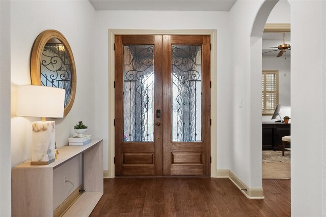 12500 Verandah Ct, Austin, TX 78726 - entrance foyer featuring dark wood-style flooring, arched walkways, and a ceiling fan