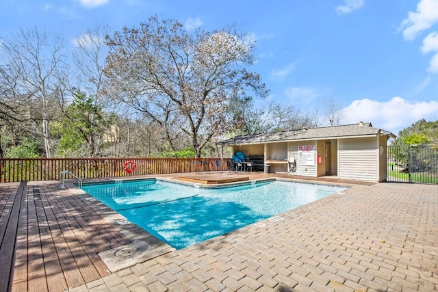 pool featuring a patio area