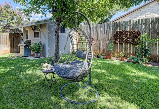 view of yard featuring a fenced backyard