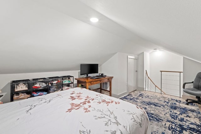 bedroom featuring vaulted ceiling