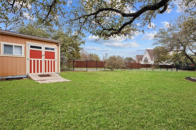 view of yard featuring a storage unit and an outdoor structure