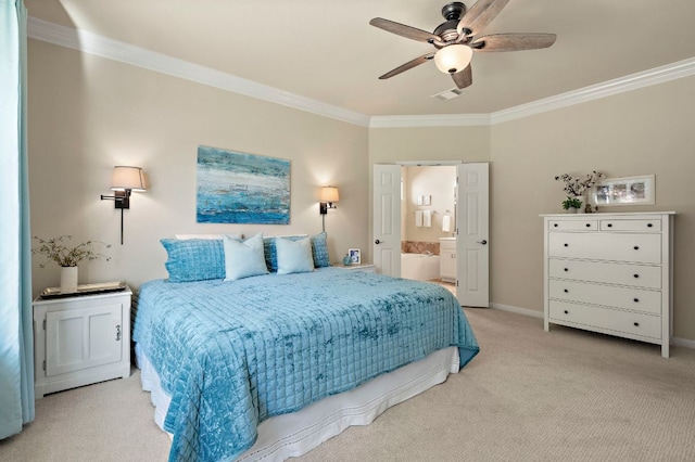 bedroom featuring visible vents, crown molding, baseboards, carpet, and ensuite bathroom