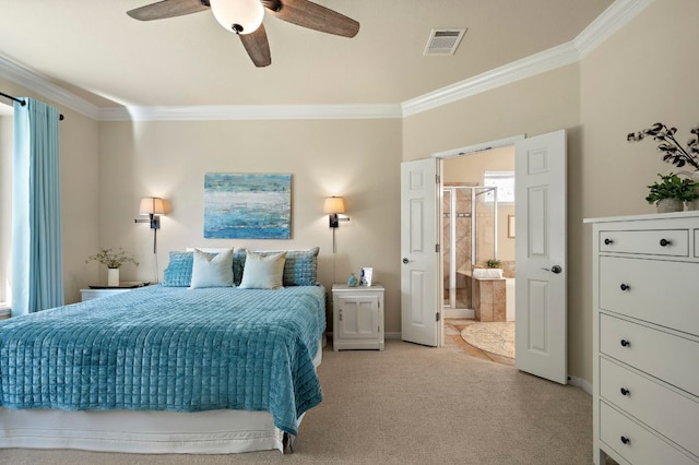 bedroom featuring visible vents, crown molding, ceiling fan, light carpet, and ensuite bath