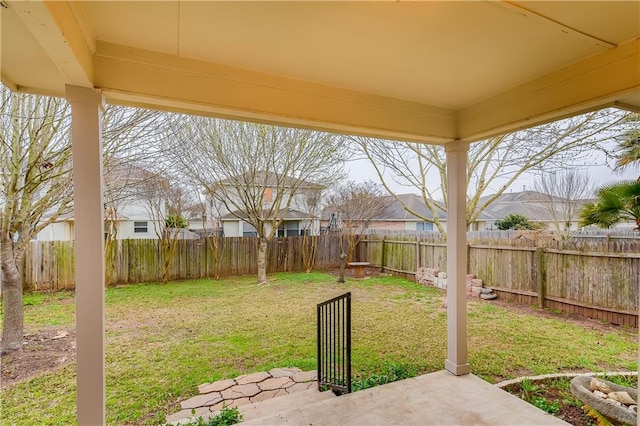 view of yard with a patio area and a fenced backyard