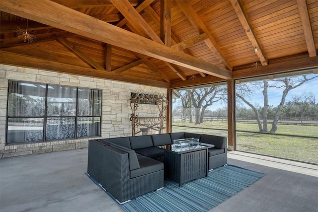 exterior space featuring lofted ceiling with beams and wood ceiling