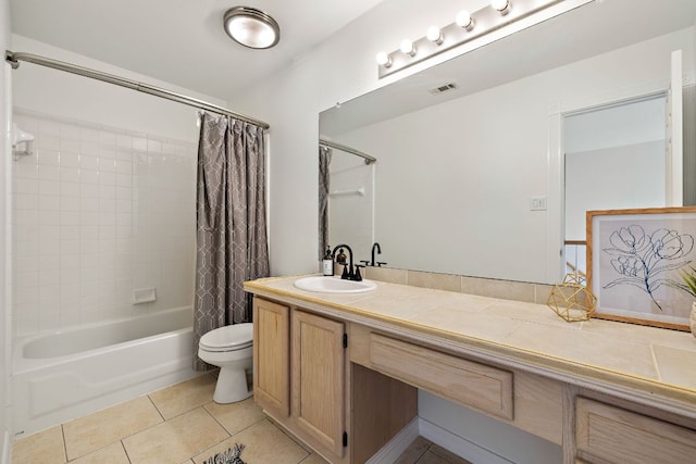 full bathroom featuring tile patterned flooring, visible vents, toilet, shower / tub combo, and vanity