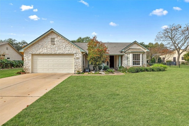 view of front facade featuring driveway, fence, a front yard, a shingled roof, and a garage