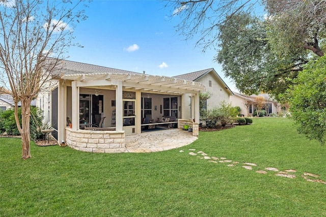 rear view of property with stucco siding, a patio, a pergola, and a yard