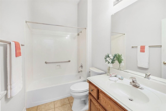 bathroom with tile patterned floors, toilet, shower / washtub combination, and vanity