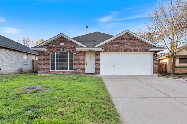 ranch-style home with brick siding, driveway, an attached garage, and a front lawn