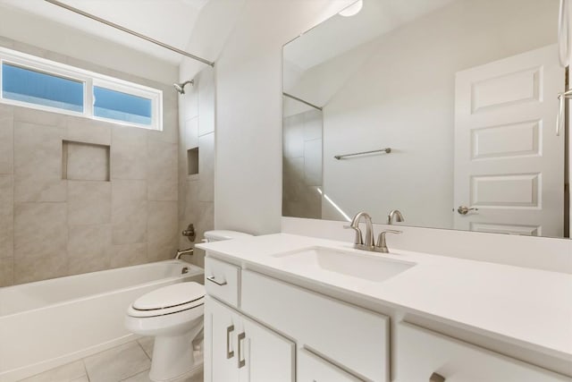 bathroom featuring tub / shower combination, vanity, toilet, and tile patterned floors