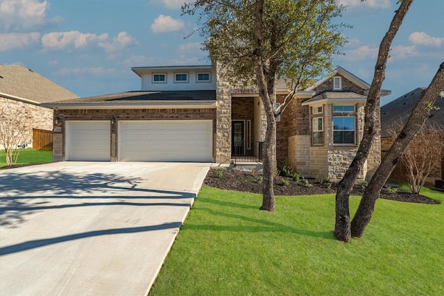 view of front of property with stone siding, a garage, driveway, and a front yard