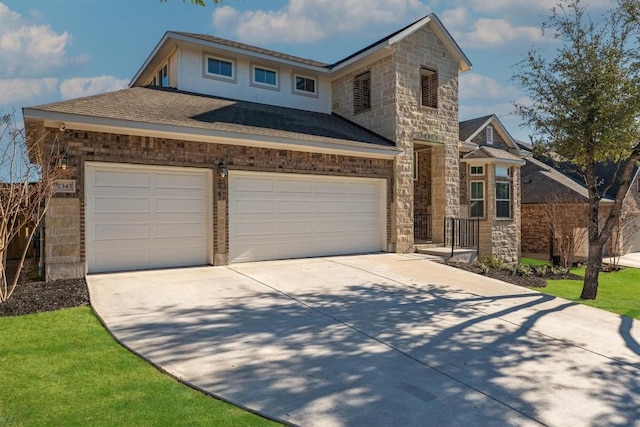 view of front of home with an attached garage, stone siding, driveway, and roof with shingles