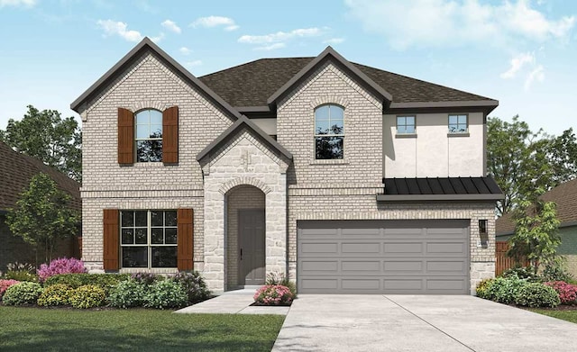 191 Dove Tree Dr, Buda, TX 78610 - french country inspired facade featuring a garage, brick siding, driveway, and stone siding
